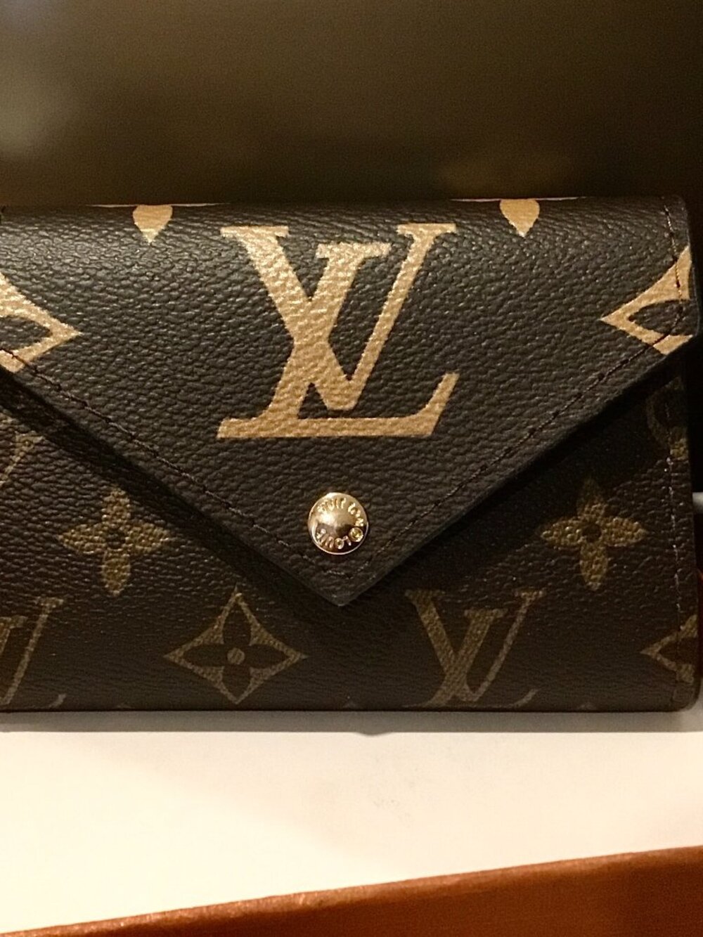 LOUIS VUITTON CREDIT BI-FOLD MONOGRAM BROWN WALLET.